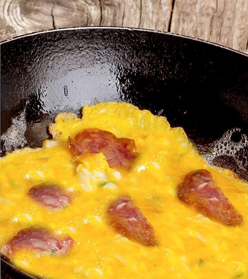 Eggs with salami and onion